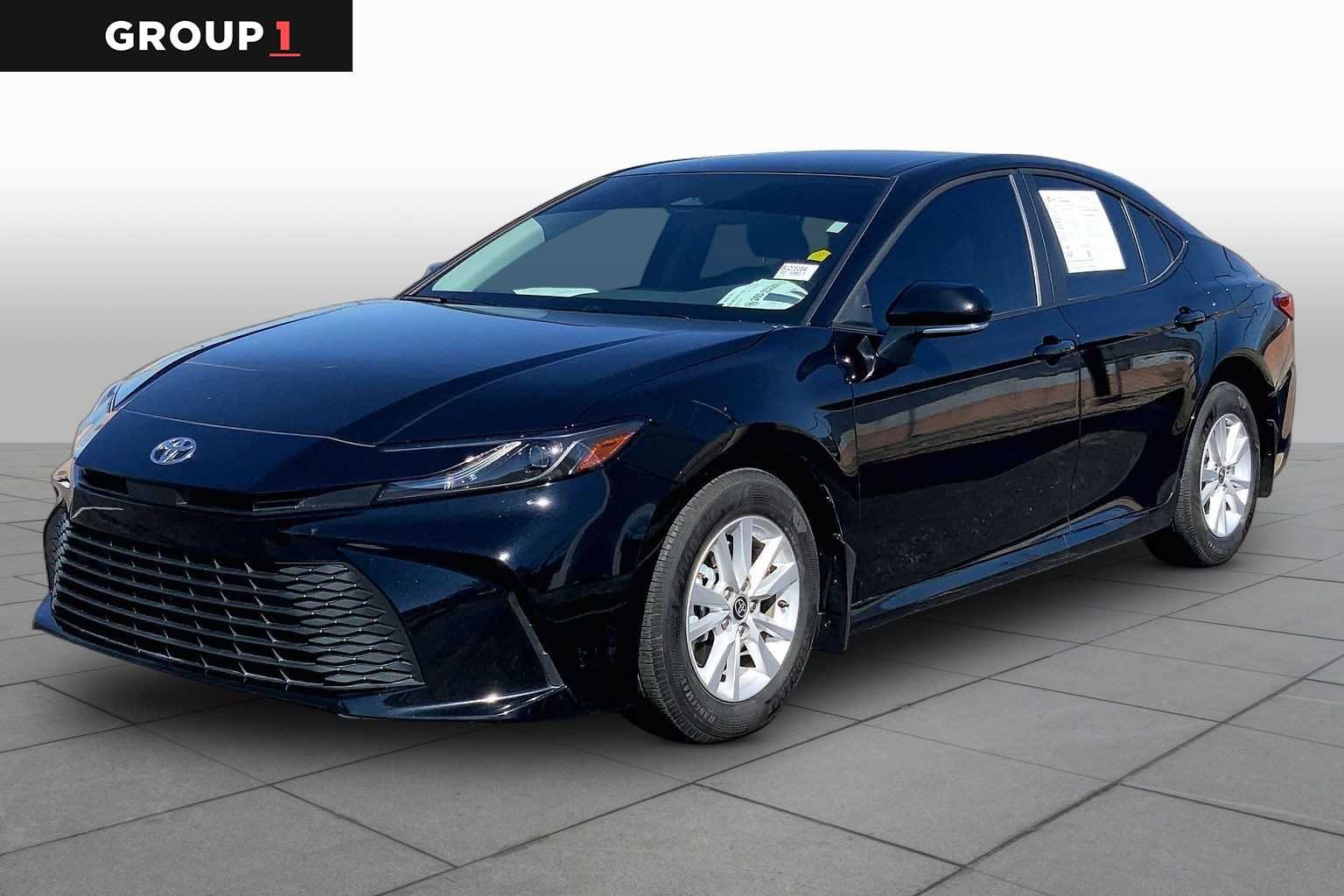 Used 2025 Midnight Black Metallic Toyota LE image 1