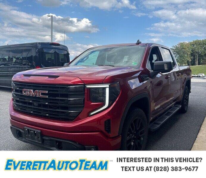 Used 2023 Volcanic Red Tintcoat GMC Elevation image 1
