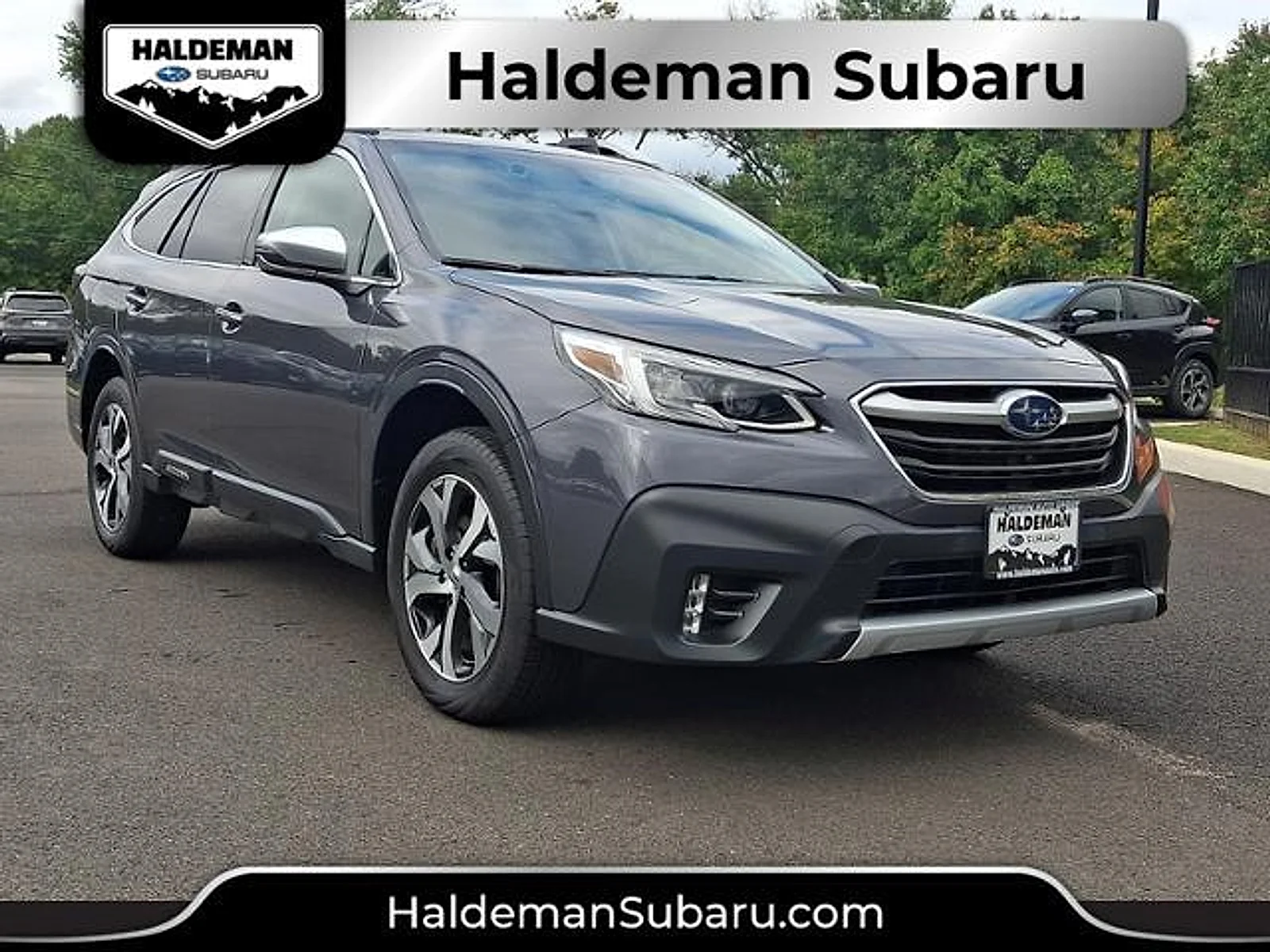 Used 2022 Magnetite Gray Metallic Subaru Touring XT image 1
