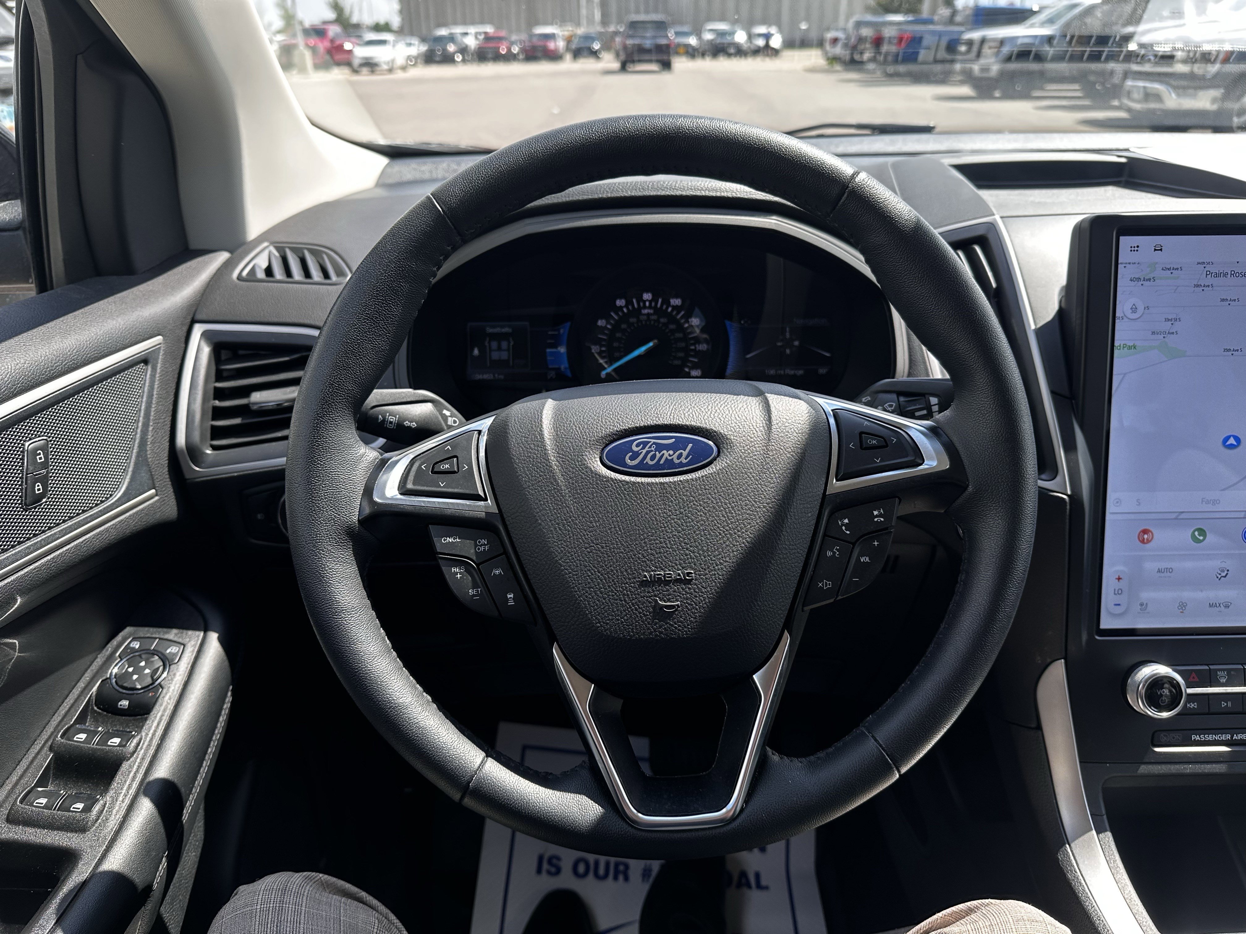 Certified Used 2024 Agate Black Metallic Ford SEL image 9