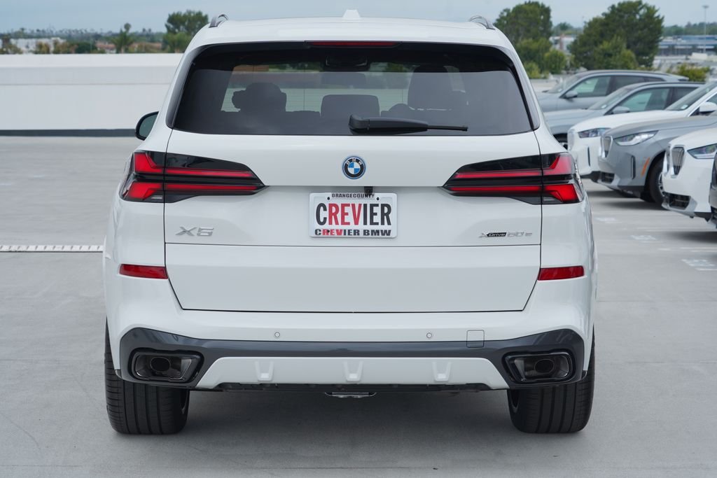 New 2026 Alpine White BMW xDrive50e image 7