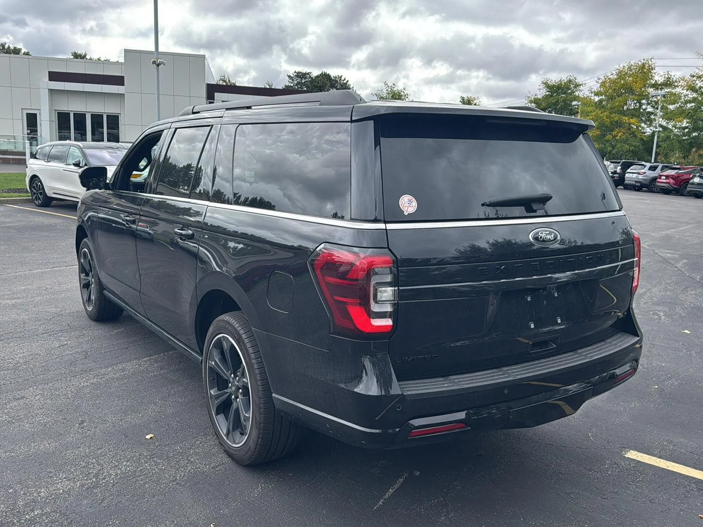 Used 2024 Agate Black Metallic Ford Limited image 3