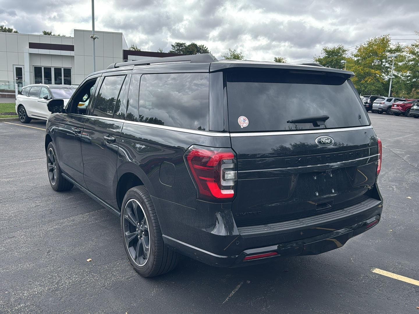 Used 2024 Agate Black Metallic Ford Limited image 3