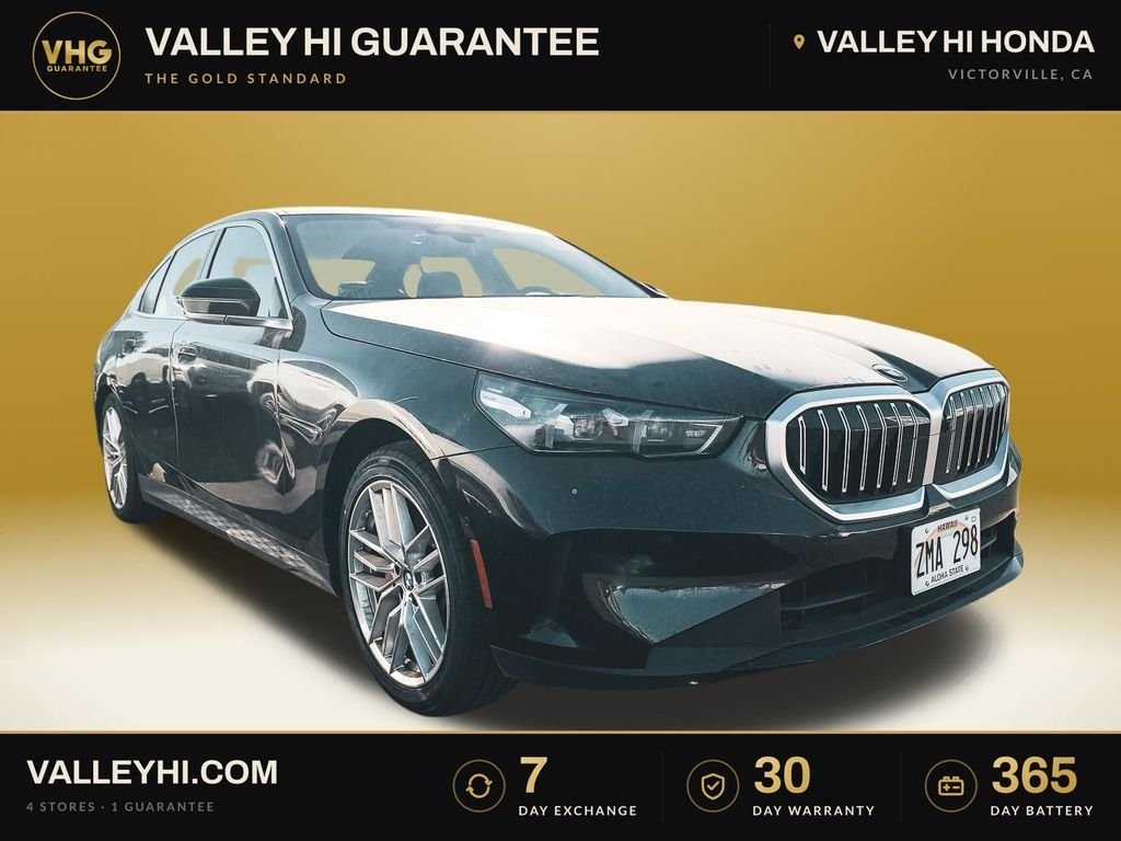 Used 2024 Black BMW 530i image 1