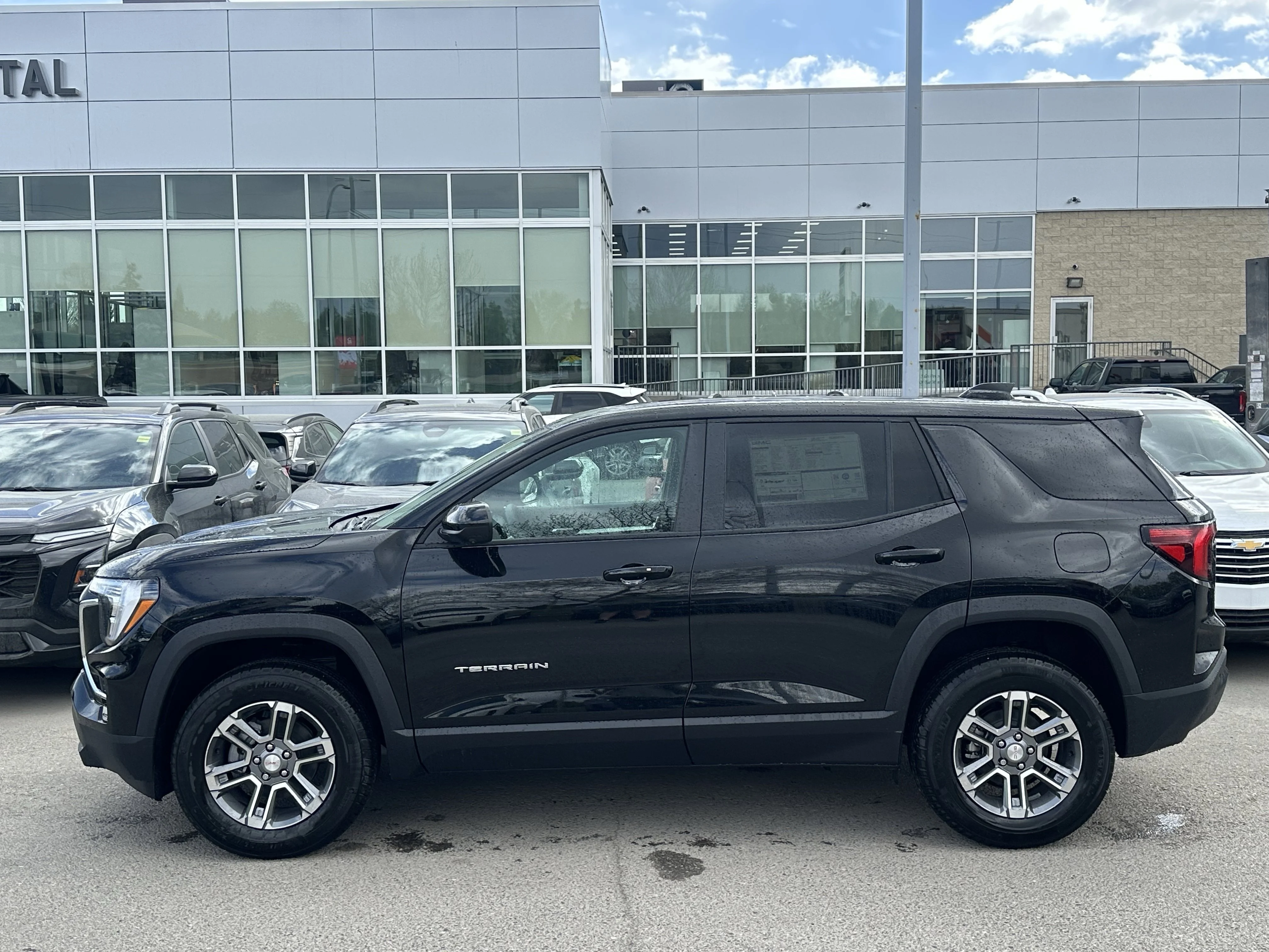 New 2026 Ebony Twilight Metallic GMC AWD Elevation image 3