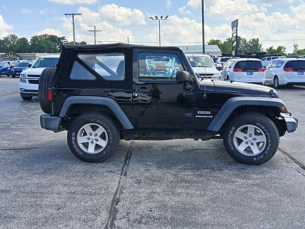 Used 2015 Black Clearcoat Jeep Sport image 5