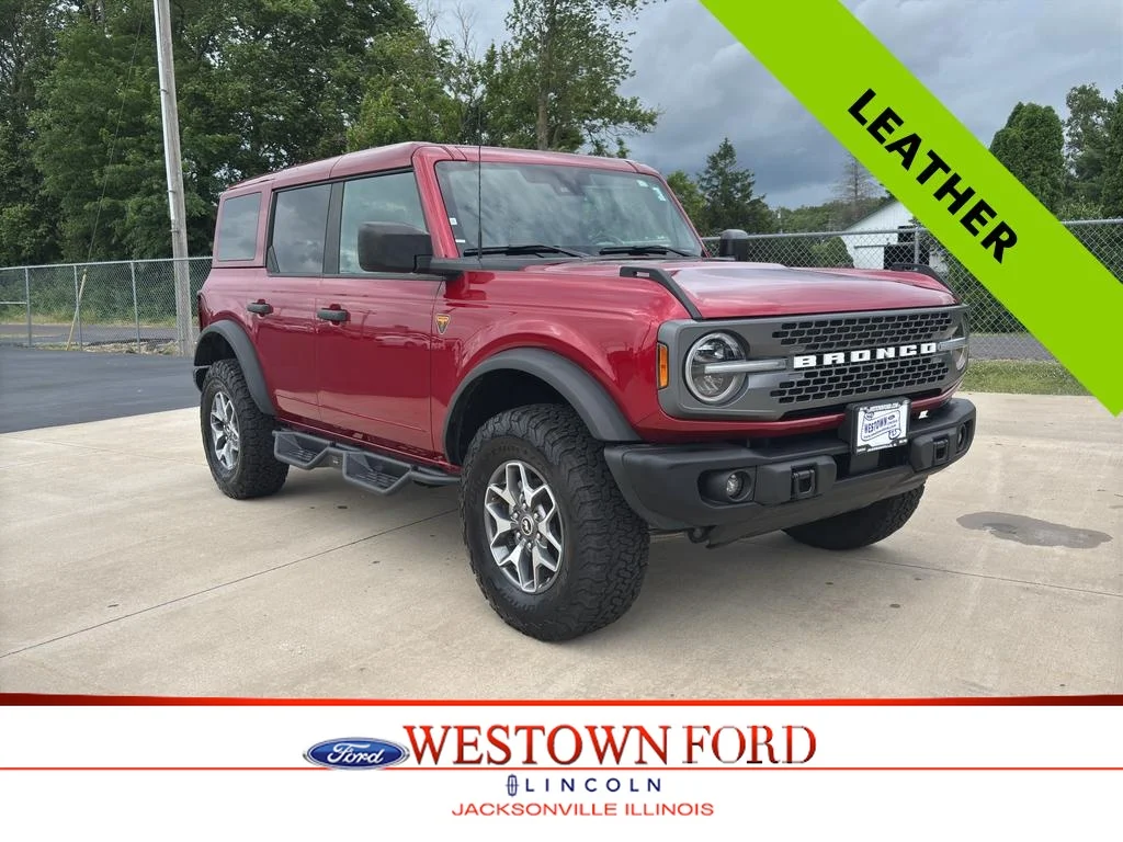 Used 2025 Ruby Red Metallic Ford Badlands image 1