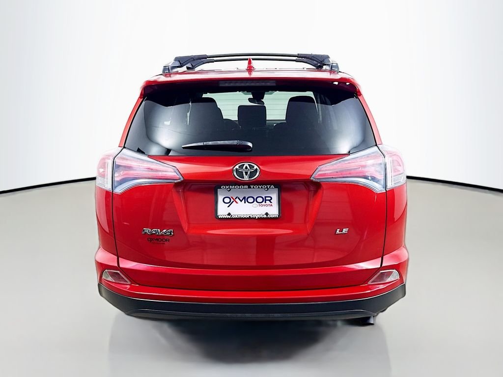 Used 2017 Barcelona Red Metallic Toyota LE image 6