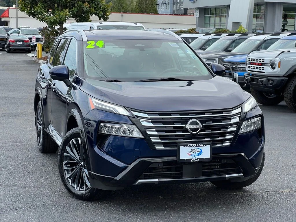Used 2024 Deep Ocean Blue Nissan Platinum image 1