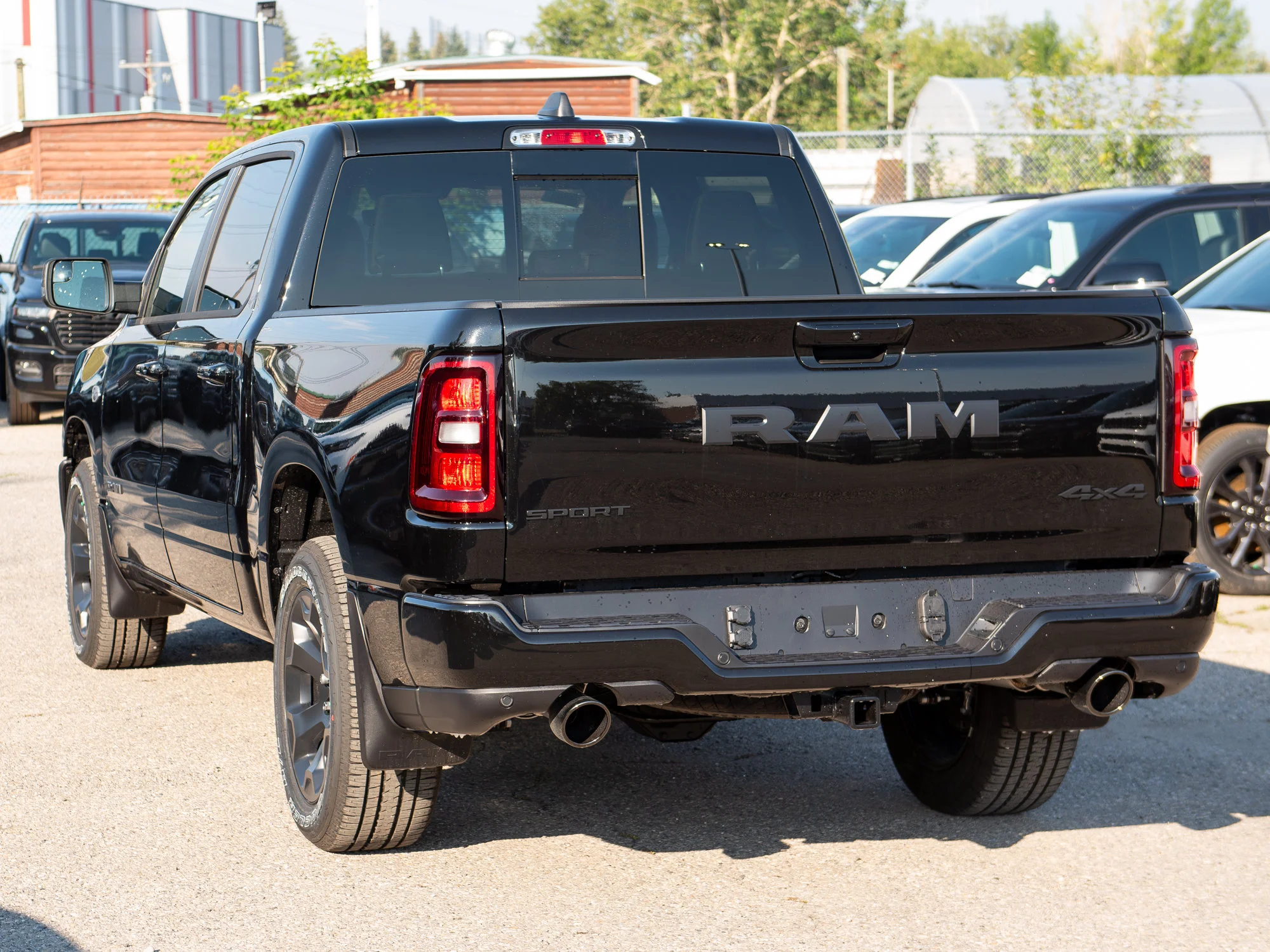 New 2026 Black RAM Sport* Crew Cab 4x4, Pano Sunroof, 3.92 Rear Axle, Passive Cold End Exhaust image 4