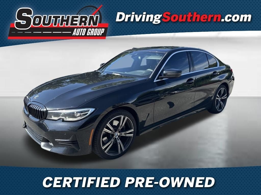 Used 2020 Black BMW 330i image 1