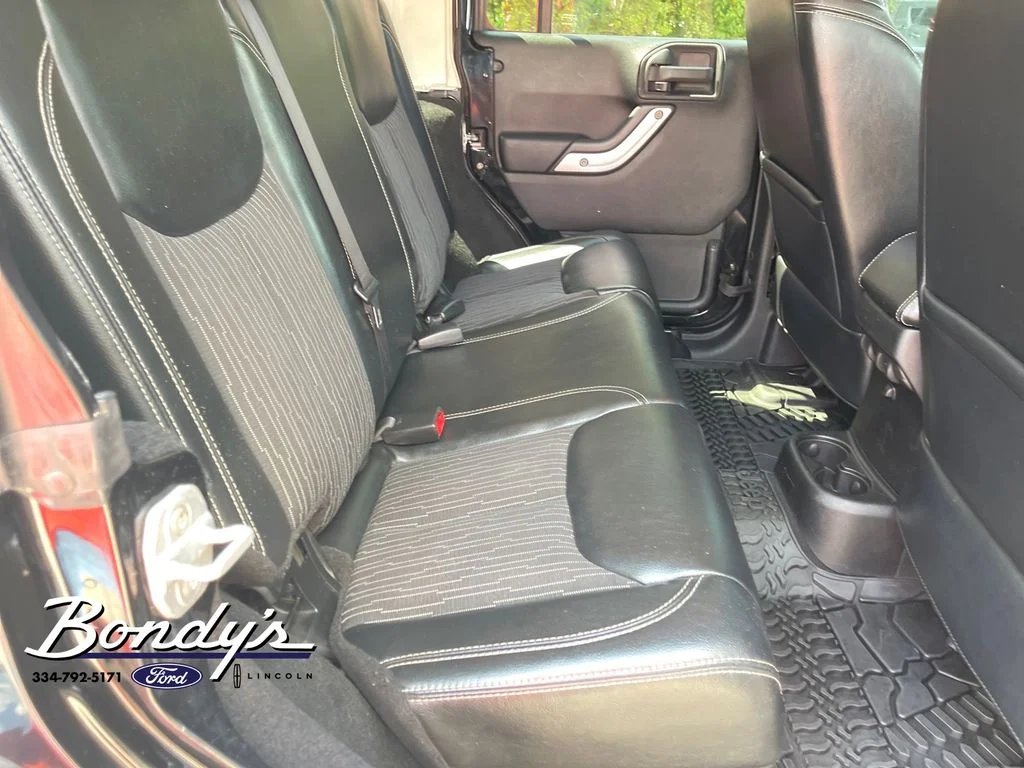 Used 2013 Black Clearcoat Jeep Unlimited Sport image 16
