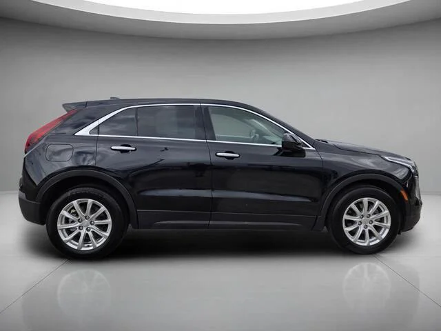 Used 2023 Stellar Black Metallic Cadillac FWD Luxury image 6