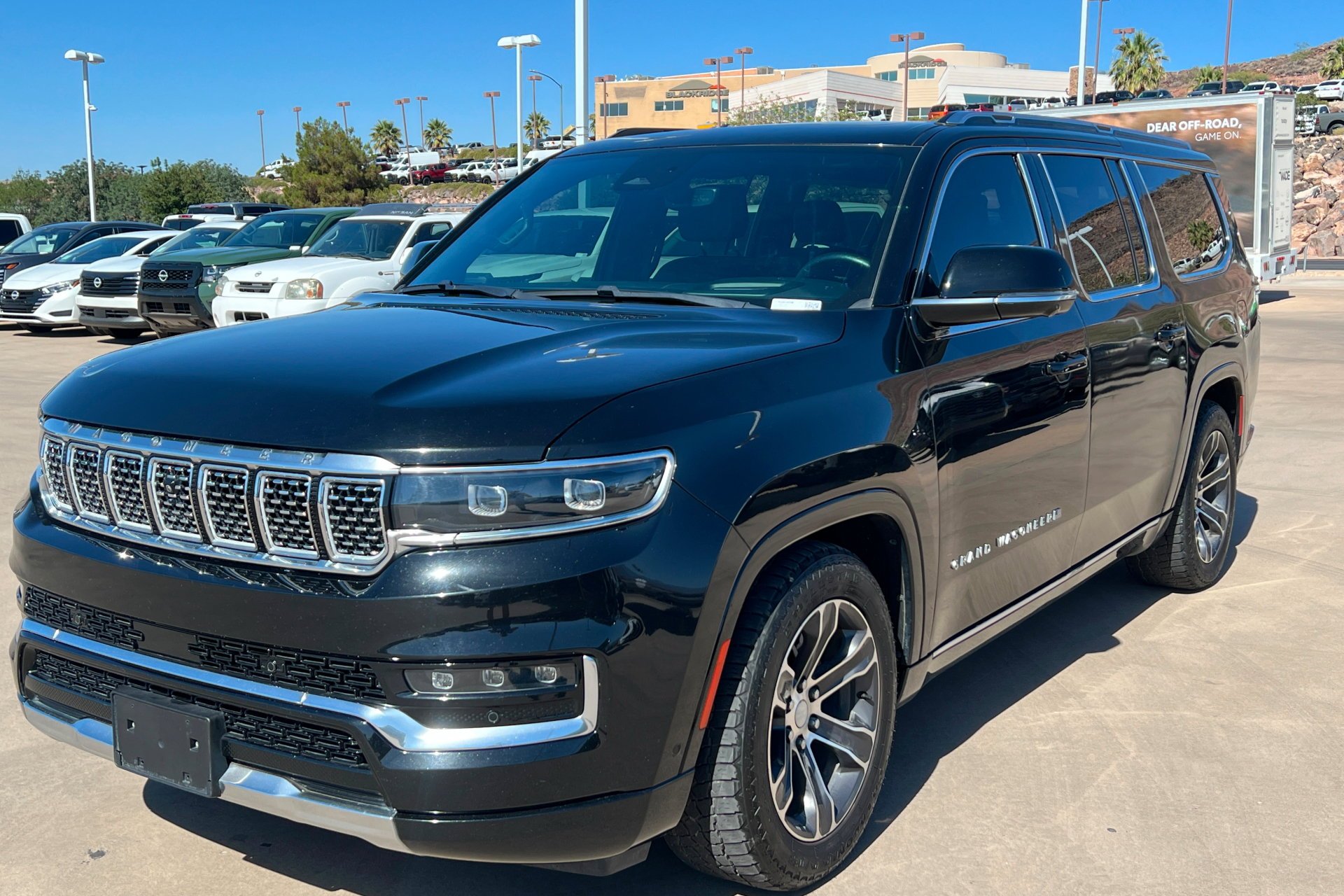 Used 2024 Diamond Black Crystal Pearlcoat Jeep Base image 1