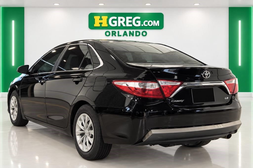Used 2016 Midnight Black Metallic Toyota LE image 2