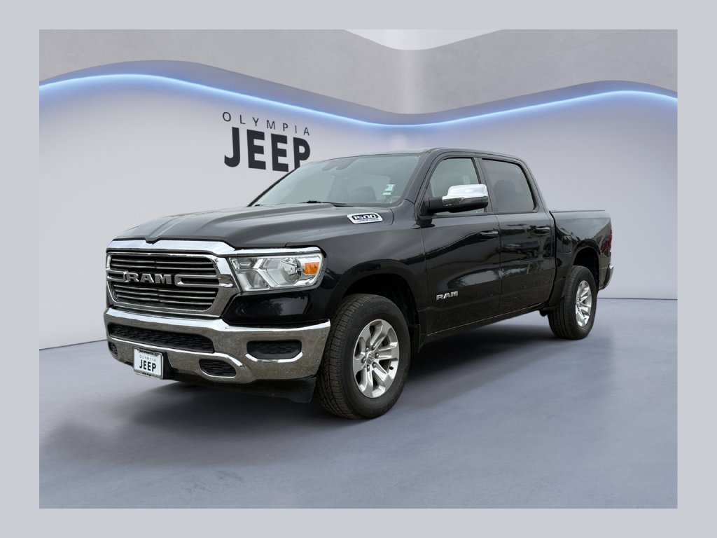 Used 2024 Diamond Black Ram Laramie image 1