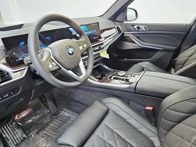 Used 2025 Black Sapphire Metallic BMW xDrive50e image 2