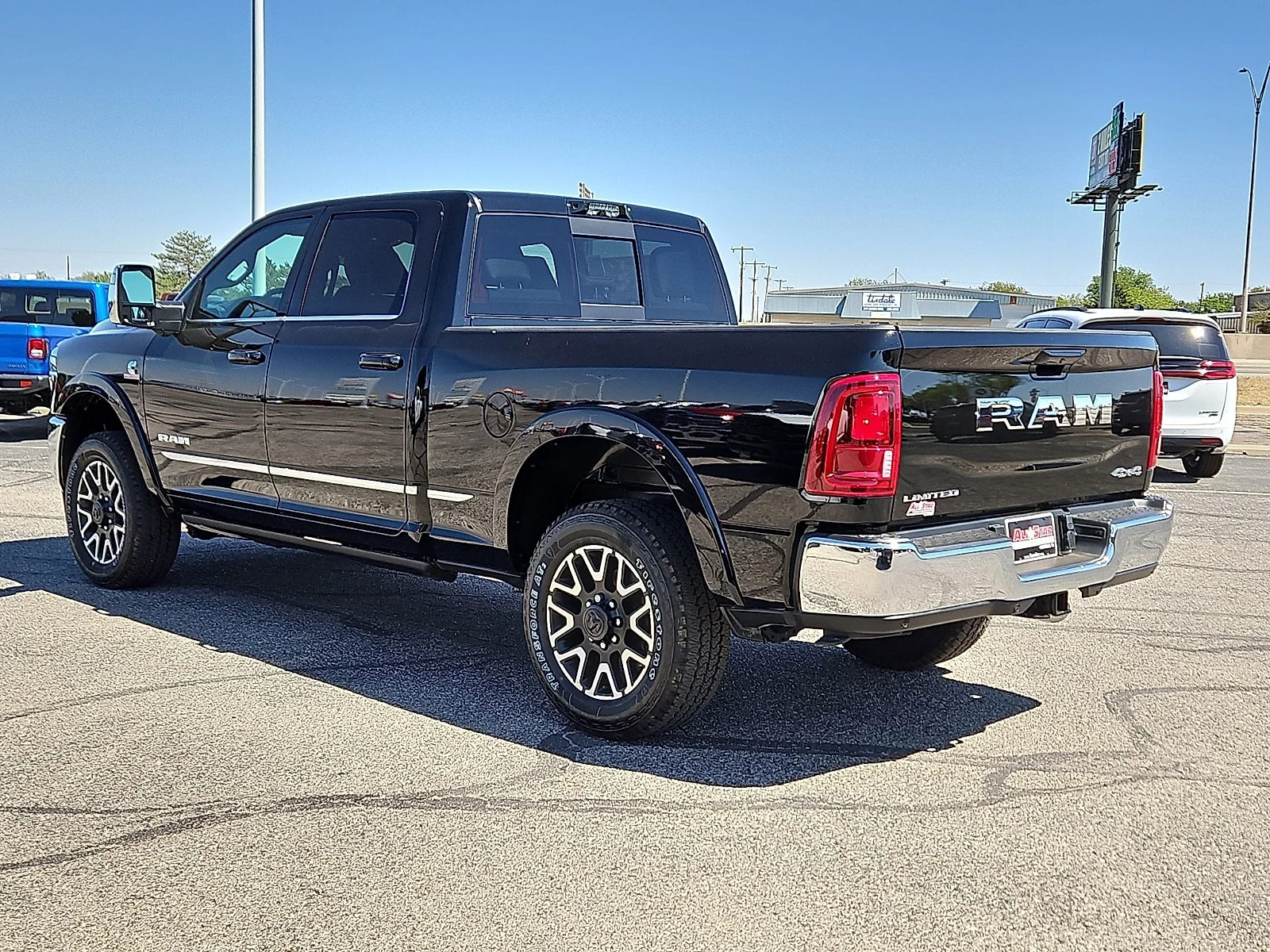 New 2026 Diamond Black Crystal Pearlcoat Ram LIMITED CREW CAB 4X4 6