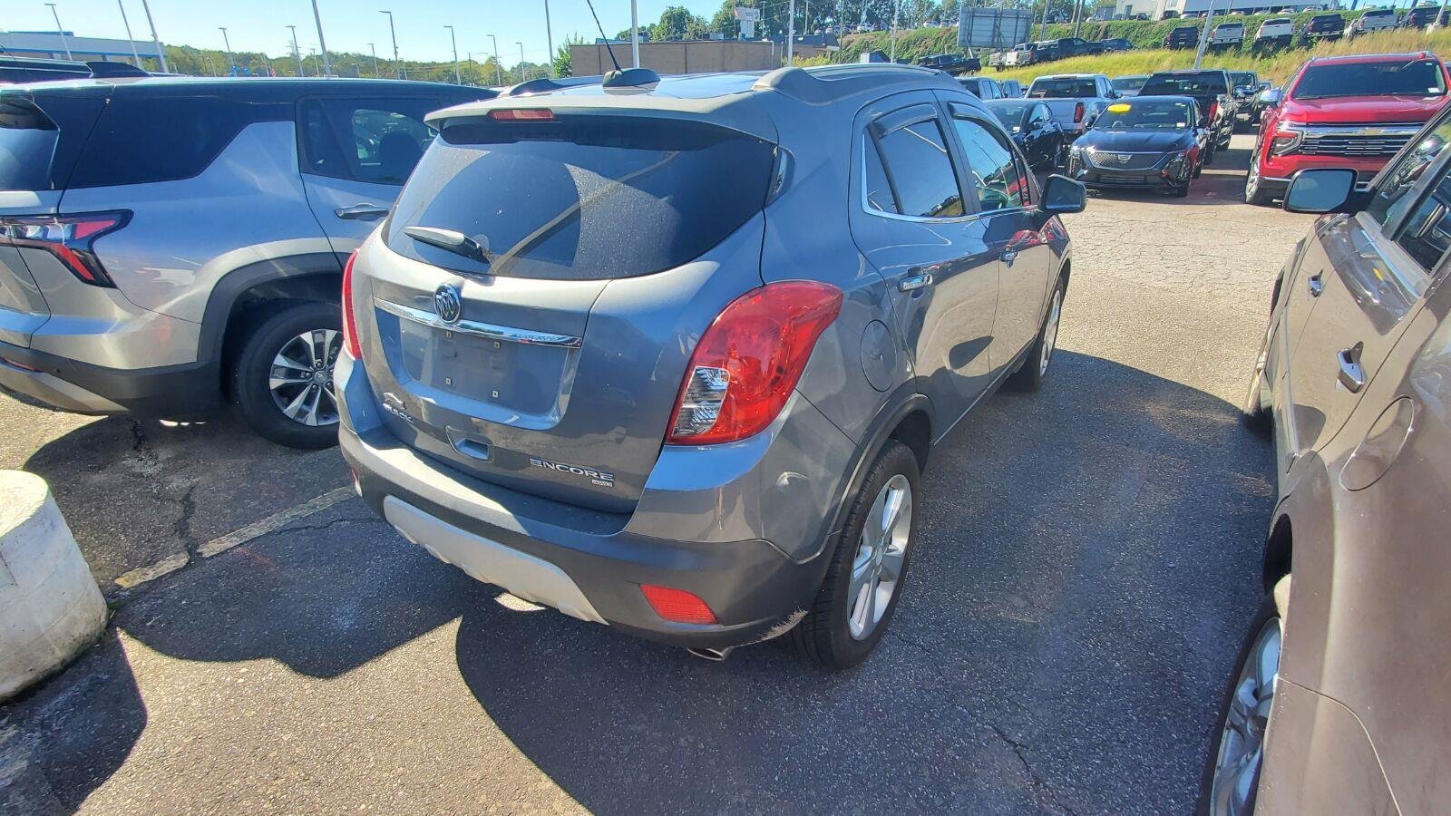 Used 2015 (Built out for 2015 model year. Includes (BT3) Dark Argent Metallic lower accent color.) Buick AWD 4dr image 9