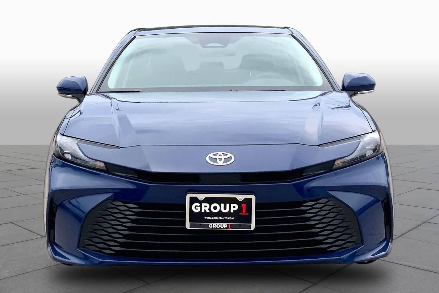 Used 2025 Reservoir Blue Toyota LE image 4