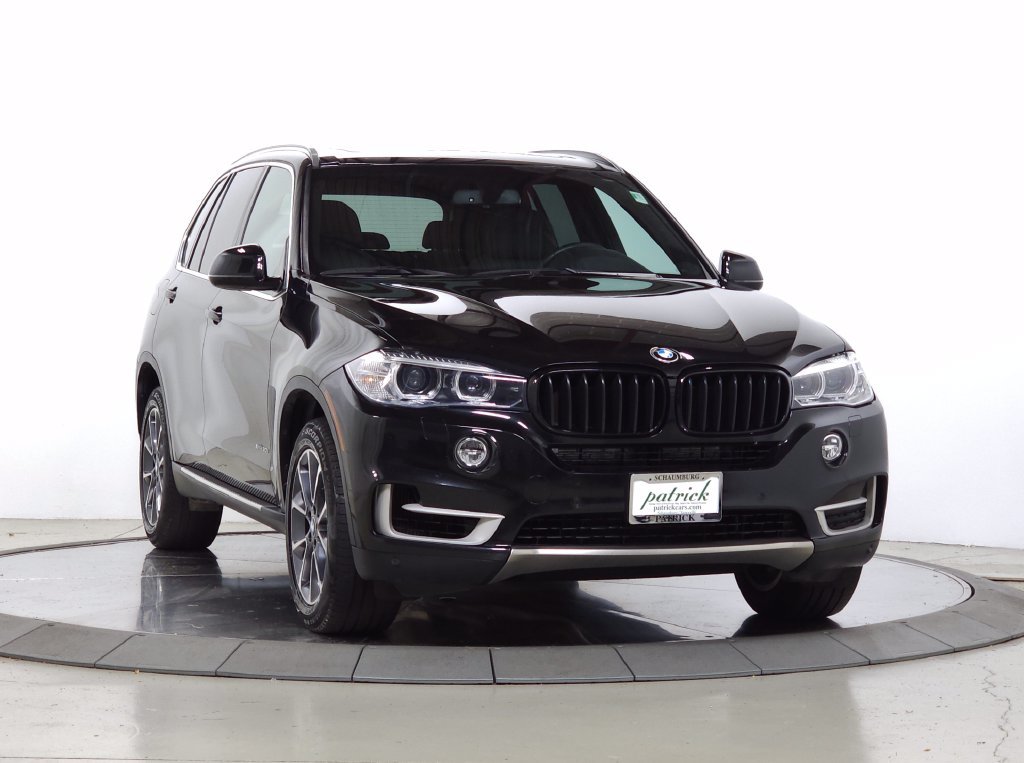 Used 2017 Black Sapphire Metallic BMW xDrive50i image 1
