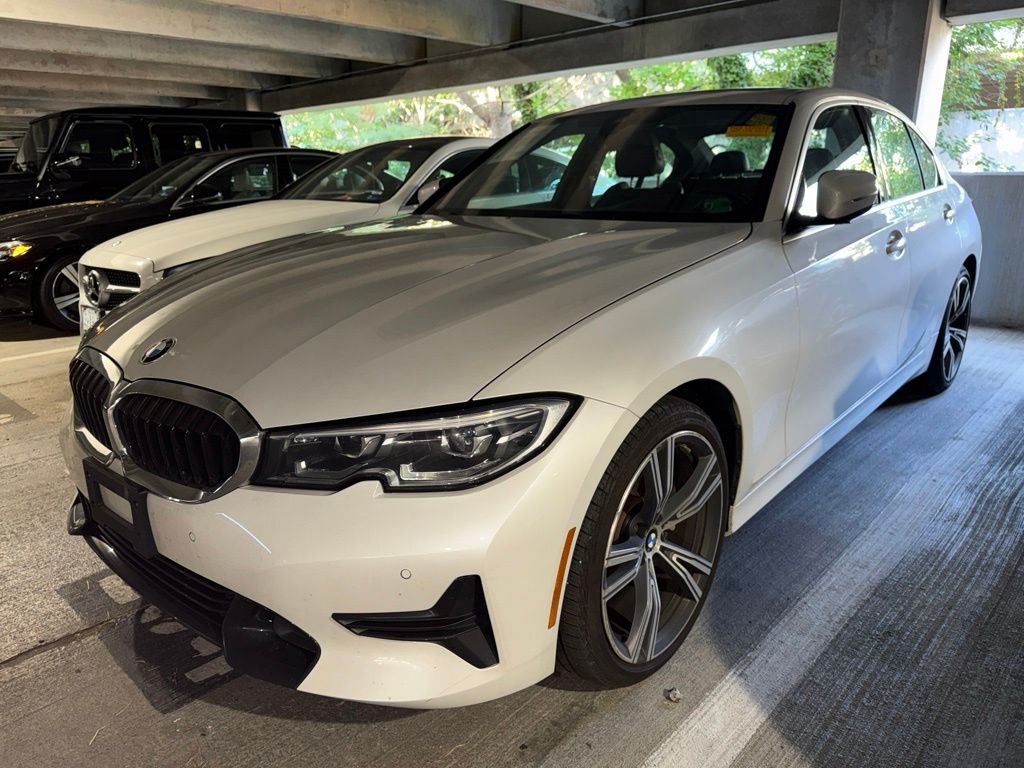 Used 2020 White Metallic BMW 330i xDrive image 1