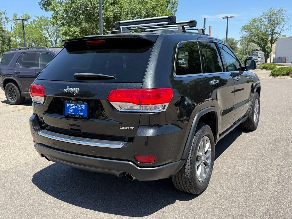 Used 2014 Brilliant Black Crystal Pearlcoat Jeep Limited image 4