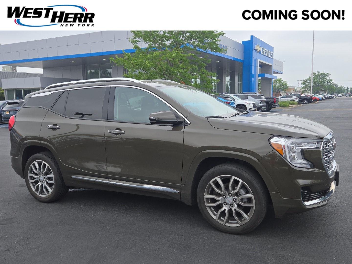 Used 2023 Deep Bronze Metallic GMC Denali image 1