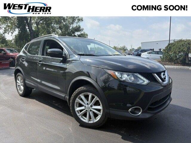 Used 2018 Magnetic Black Nissan SV image 1