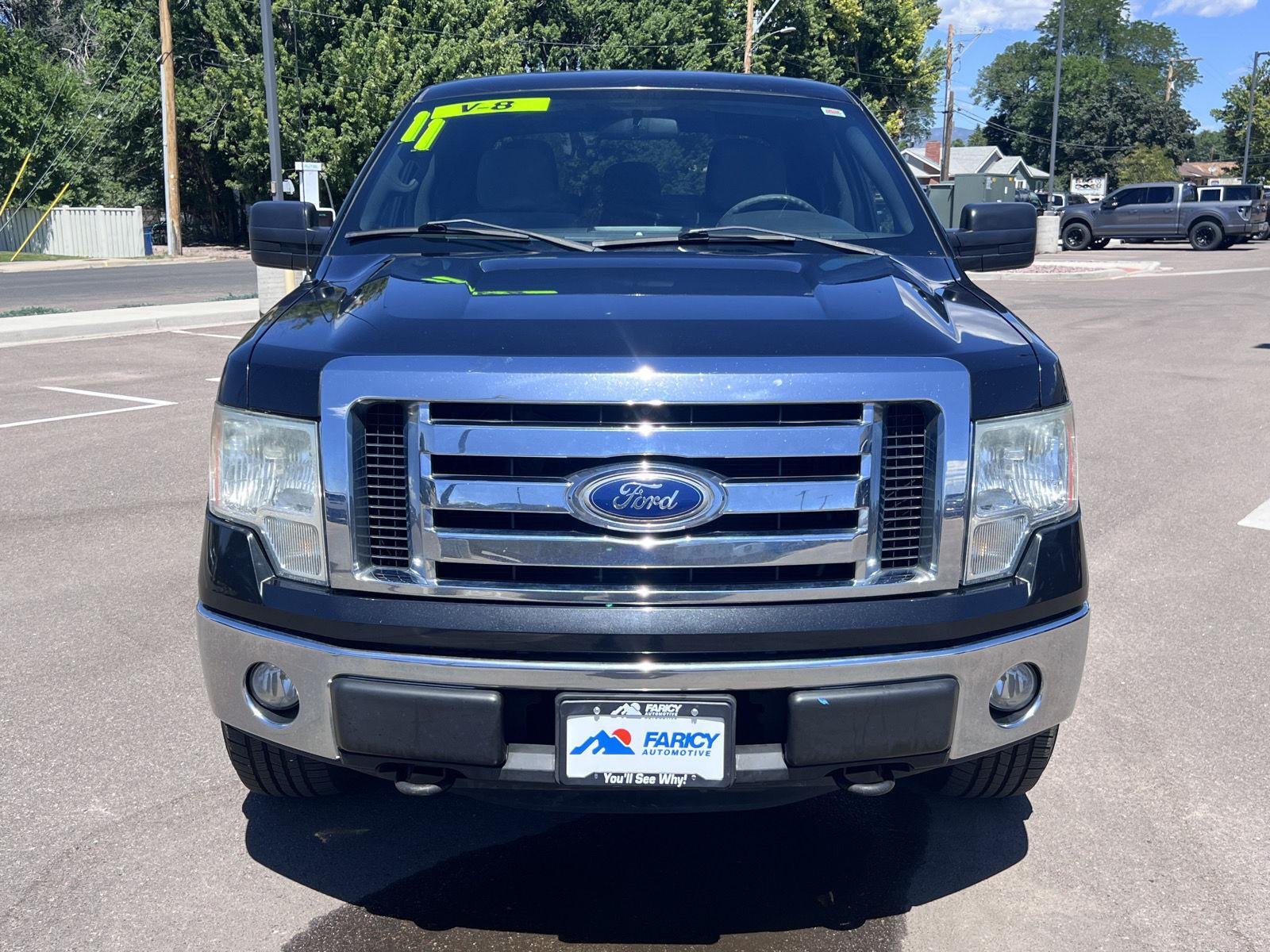 Used 2011 Tuxedo Black Metallic Ford XLT image 2