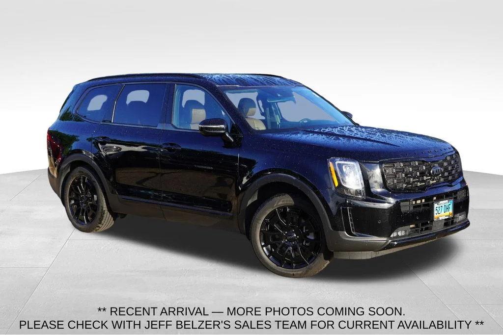 Used 2021 Ebony Black Kia SX image 1