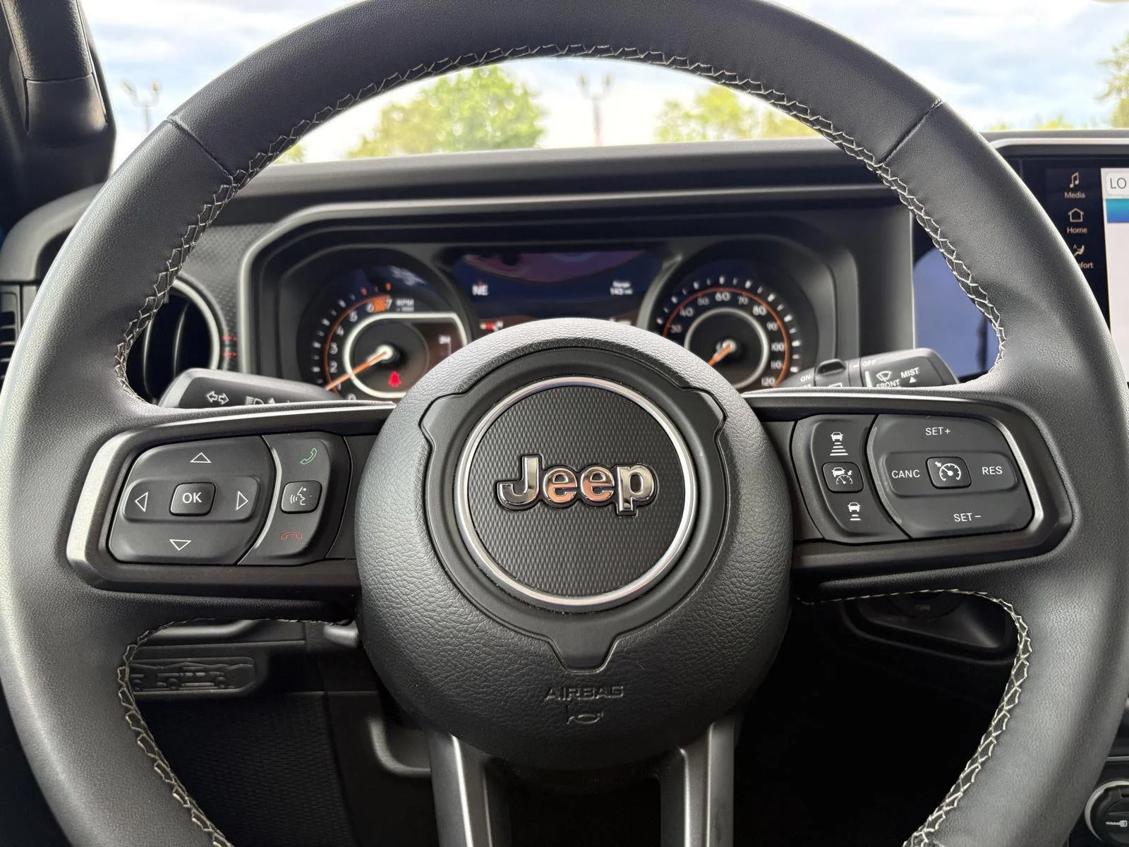 Used 2025 Hydro Blue Pearlcoat Jeep Rubicon image 24