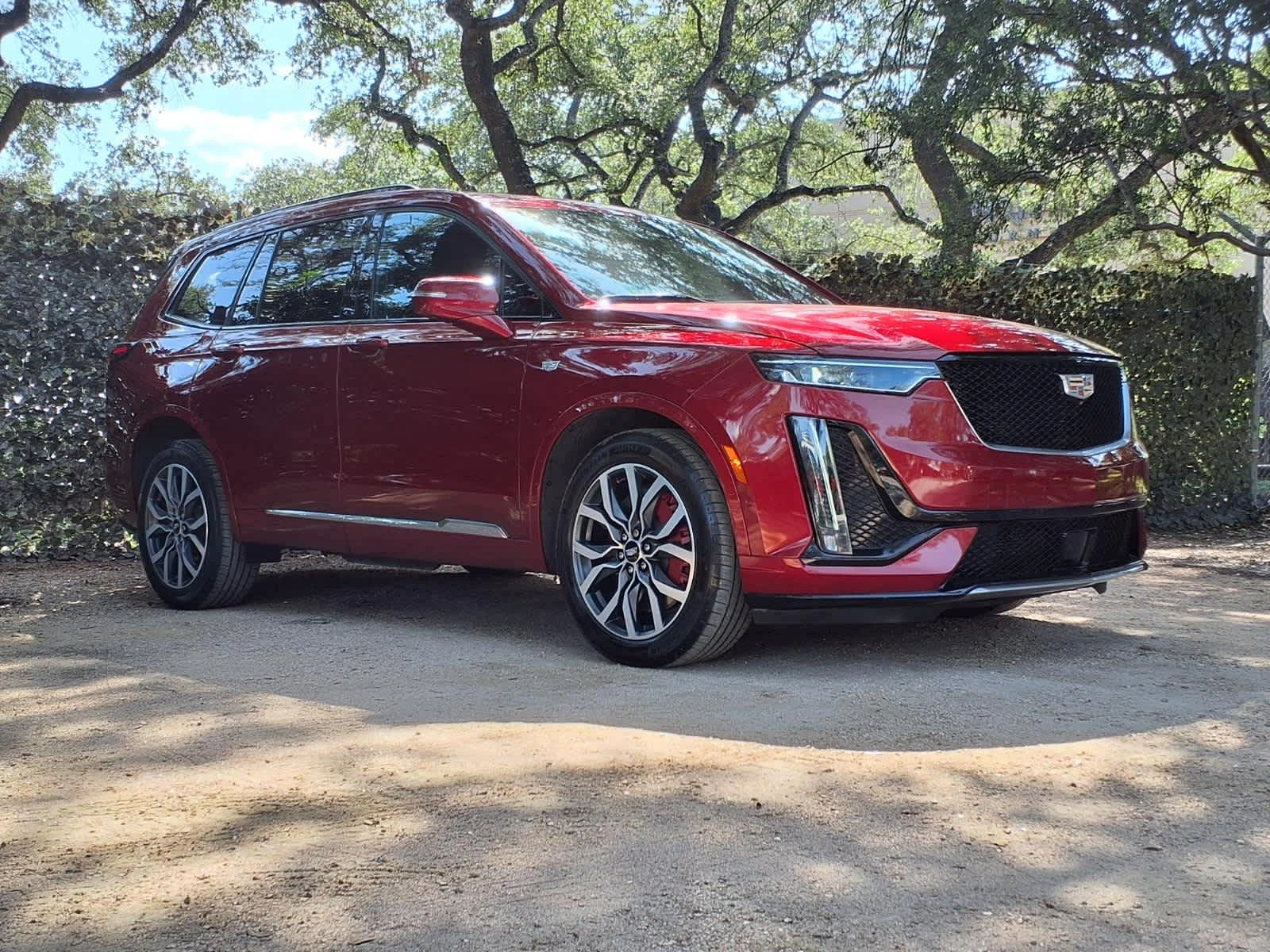 Used 2024 Radiant Red Tintcoat Cadillac Sport image 4
