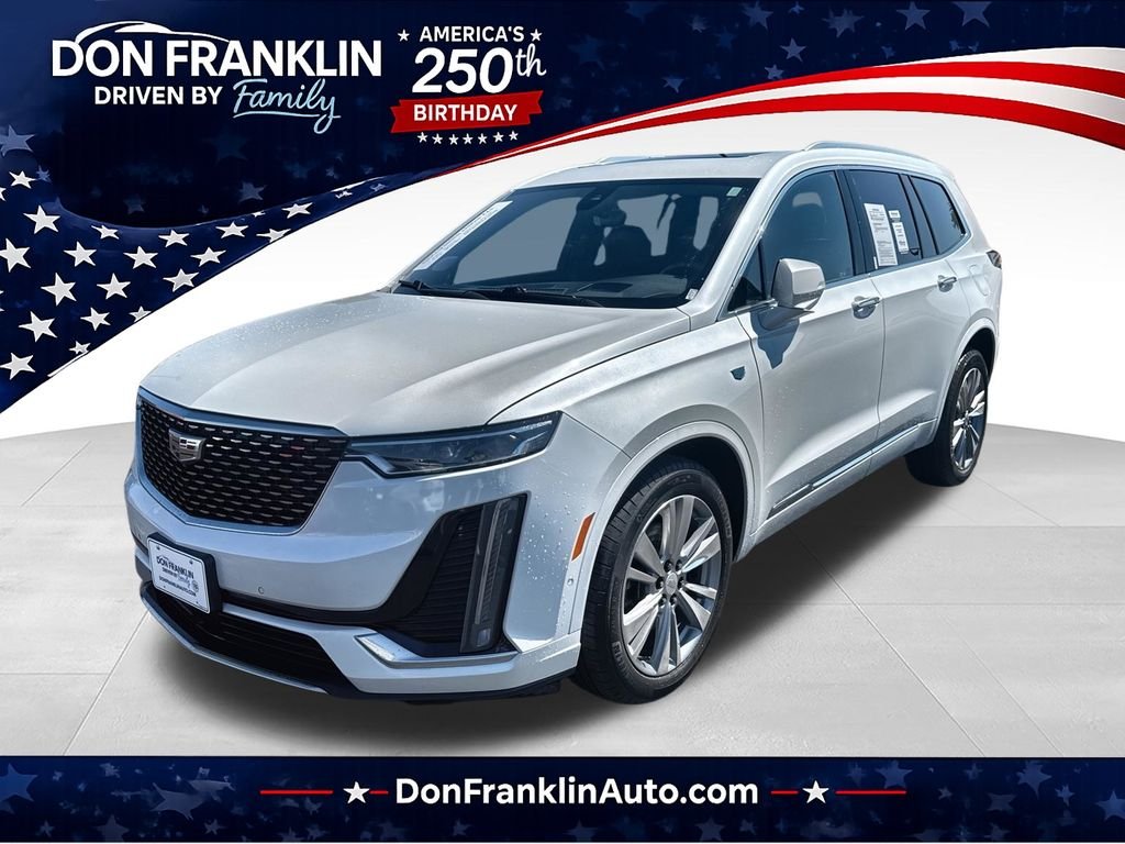 Used 2024 White Cadillac Premium Luxury image 1