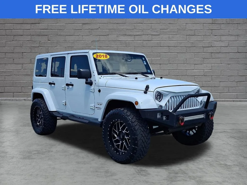 Used 2018 Bright White Clearcoat Jeep Sahara image 1