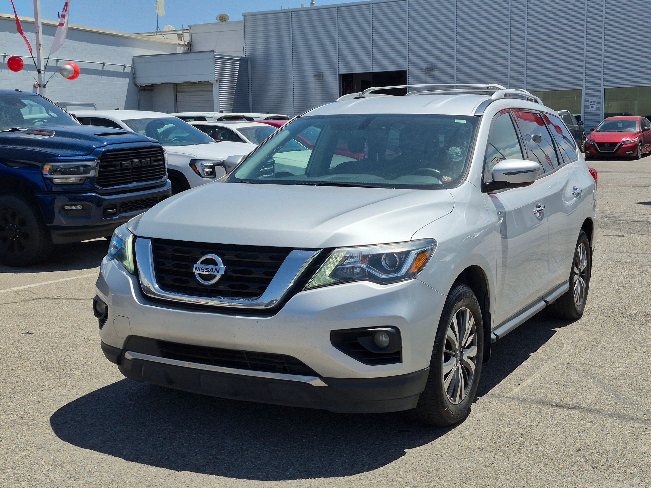 Used 2017 Brilliant Silver Metallic Nissan SV image 8