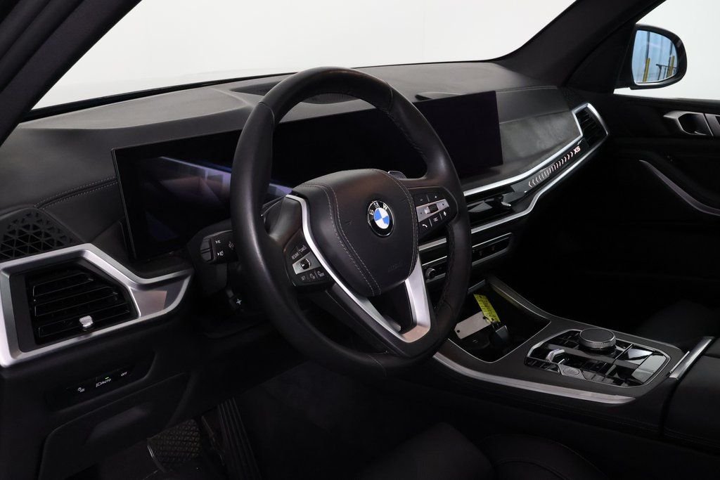Certified Used 2024 Black Sapphire Metallic BMW sDrive40i image 7