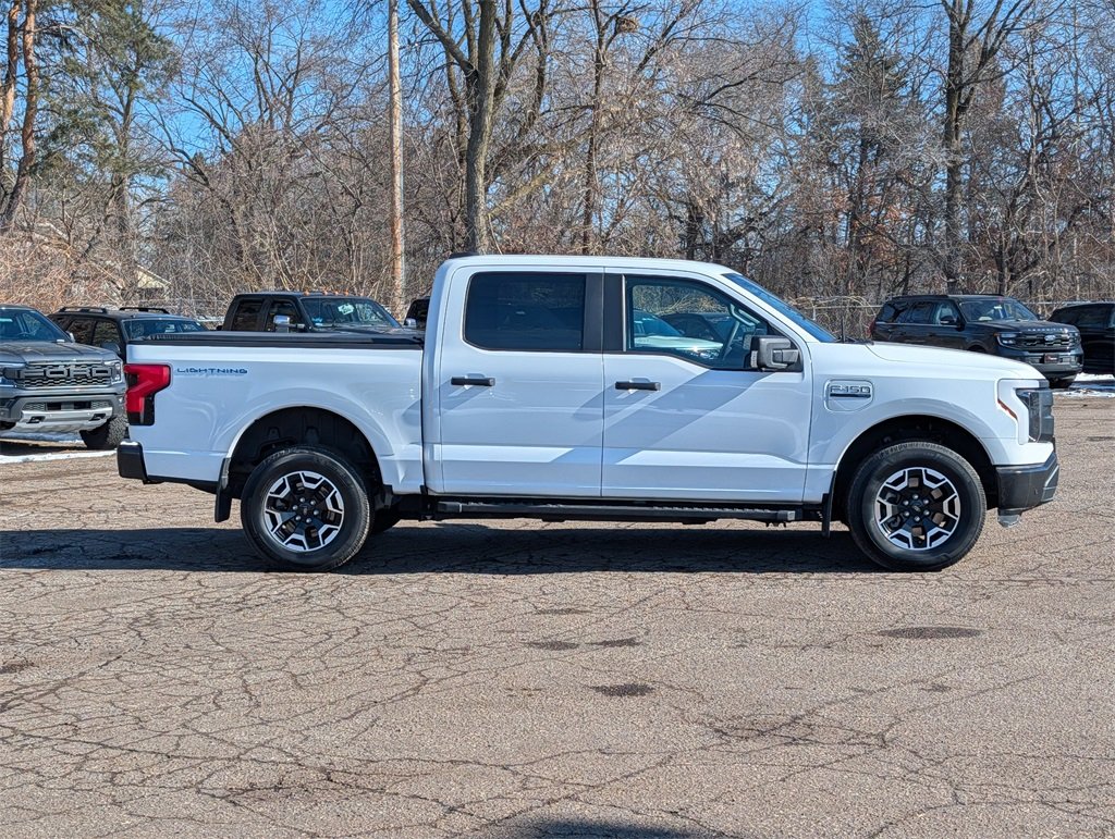 Used 2022 Ford F-150 Lightning Pro with VIN 1FTVW1EL9NWG01263 for sale in White Bear Lake, MN