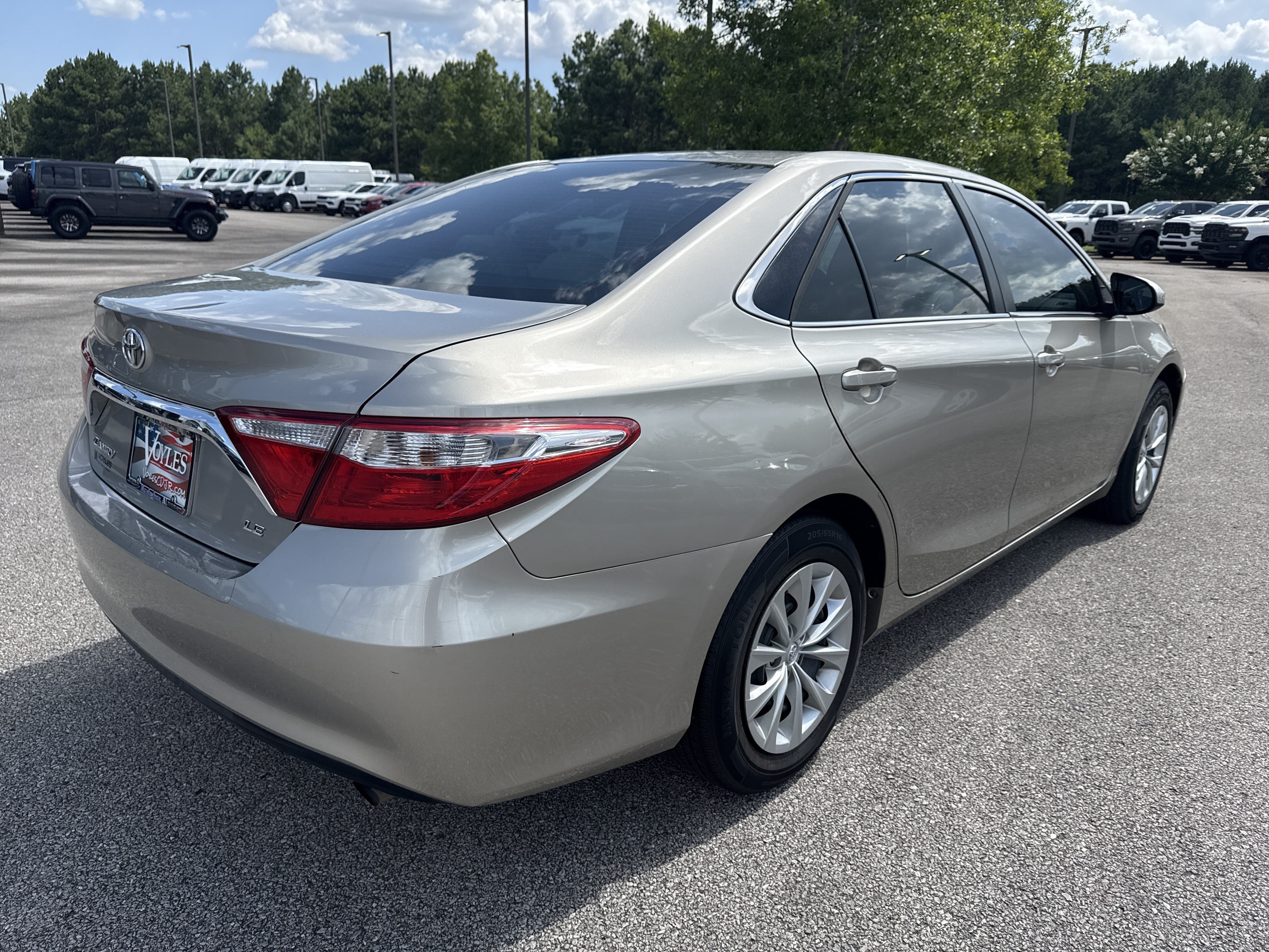 Used 2015 Gold Toyota LE image 7
