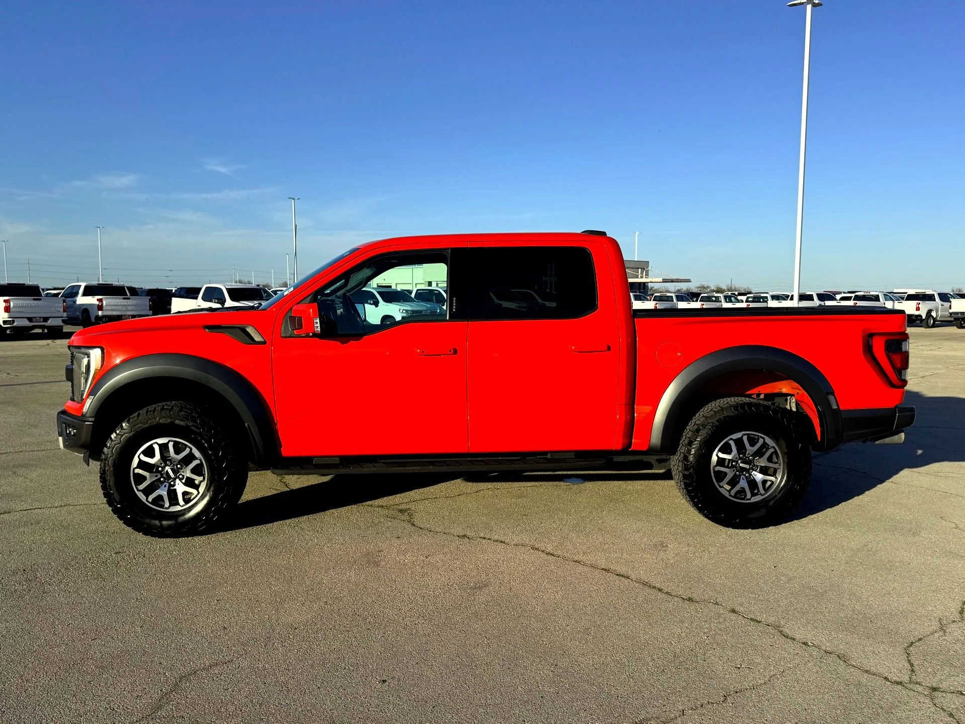 Used 2023 Orange Ford Raptor image 10