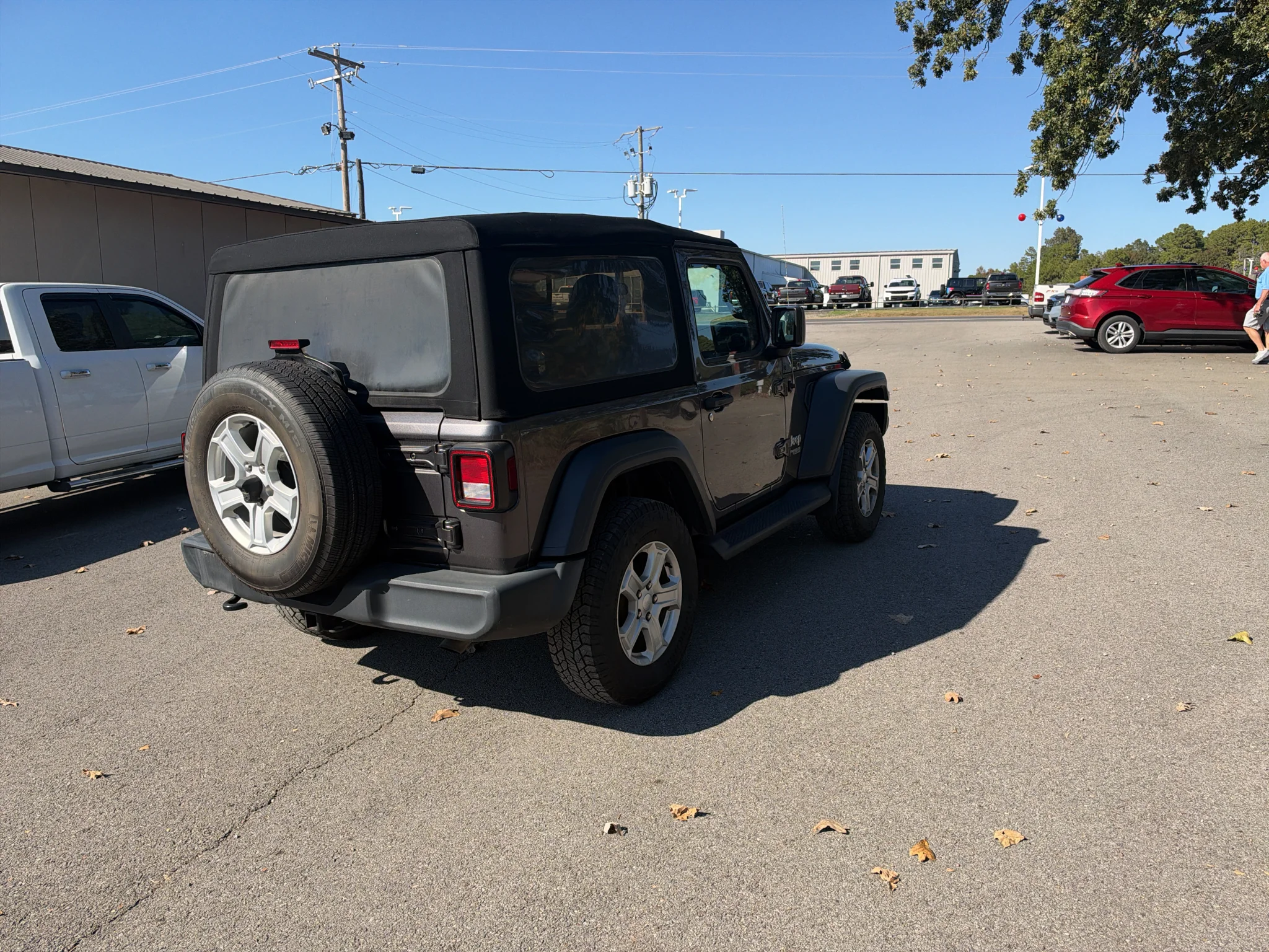 Used 2020 Granite Crystal Metallic Clearcoat Jeep Sport S image 2