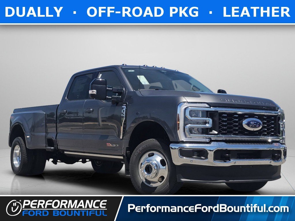 New 2026 Carbonized Gray Metallic Ford LARIAT image 1