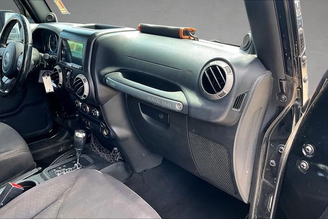 Used 2013 Black Jeep Unlimited Sport image 12
