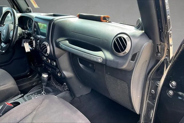 Used 2013 Black Jeep Unlimited Sport image 12