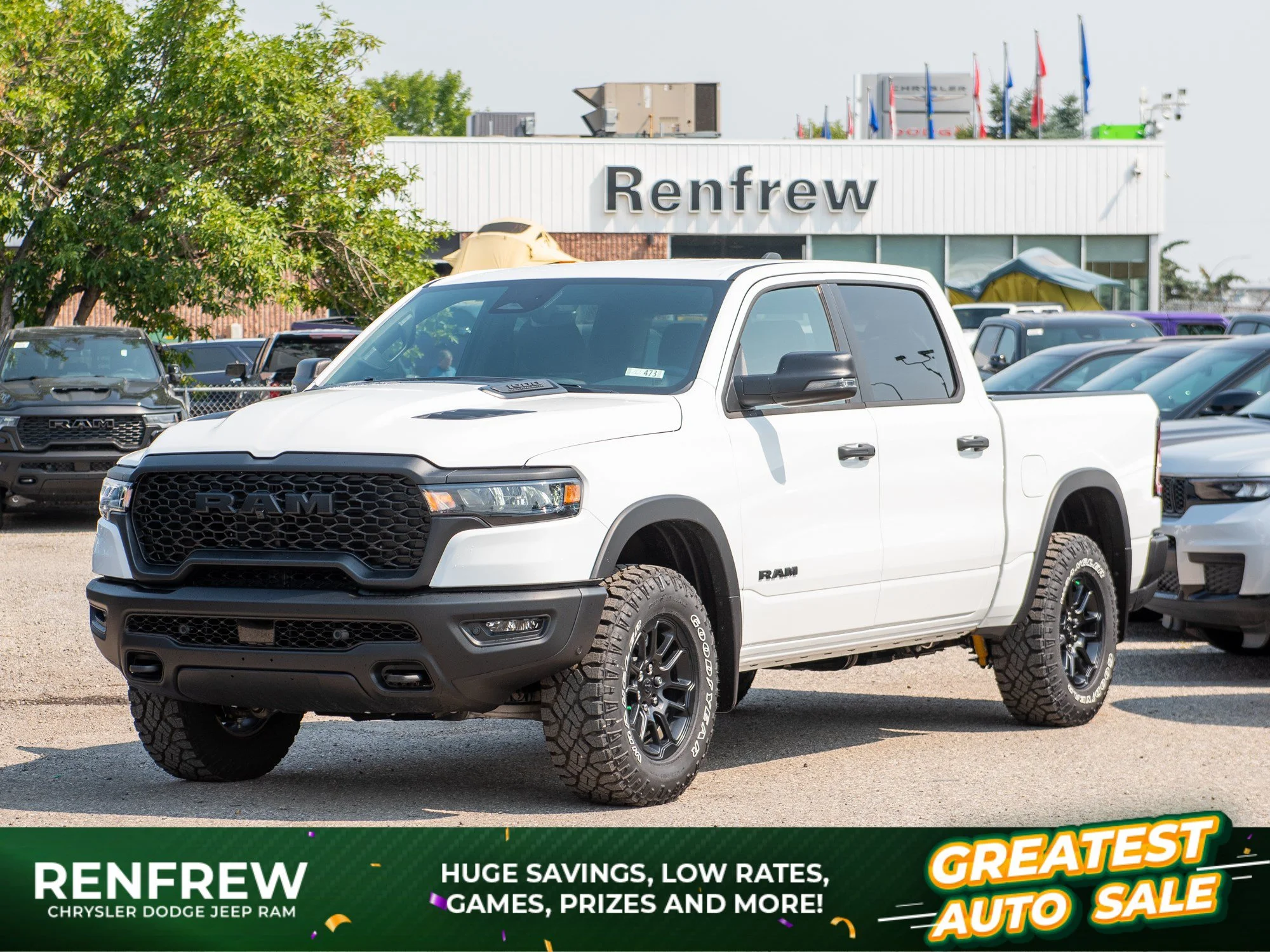 New 2026 White RAM Rebel* Crew Cab 4x4, 33 Inch A/T Tires, Factory Suspension Lift, Bilstein Shocks image 1
