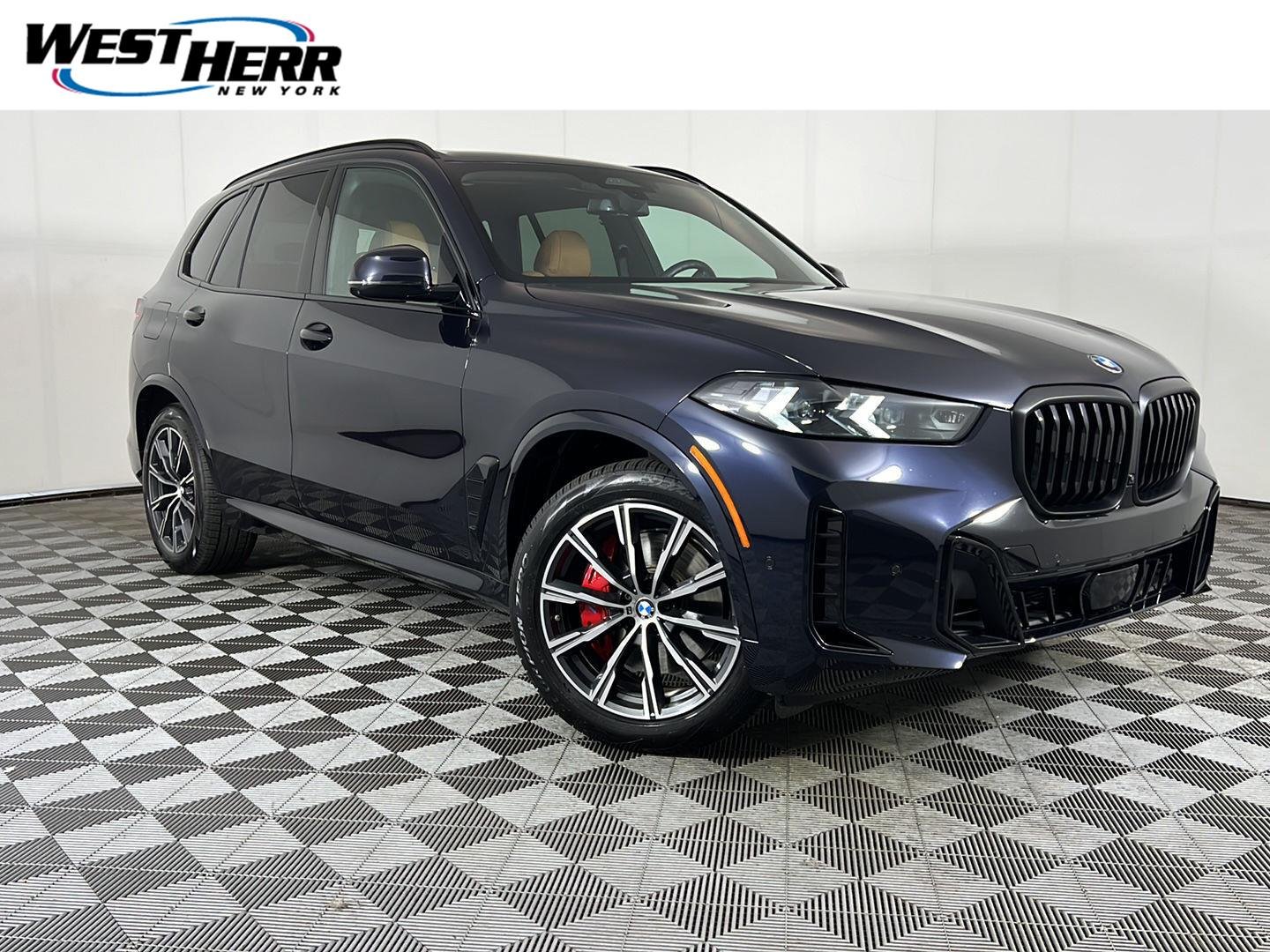 Used 2026 Carbon Black Metallic BMW xDrive40i image 1