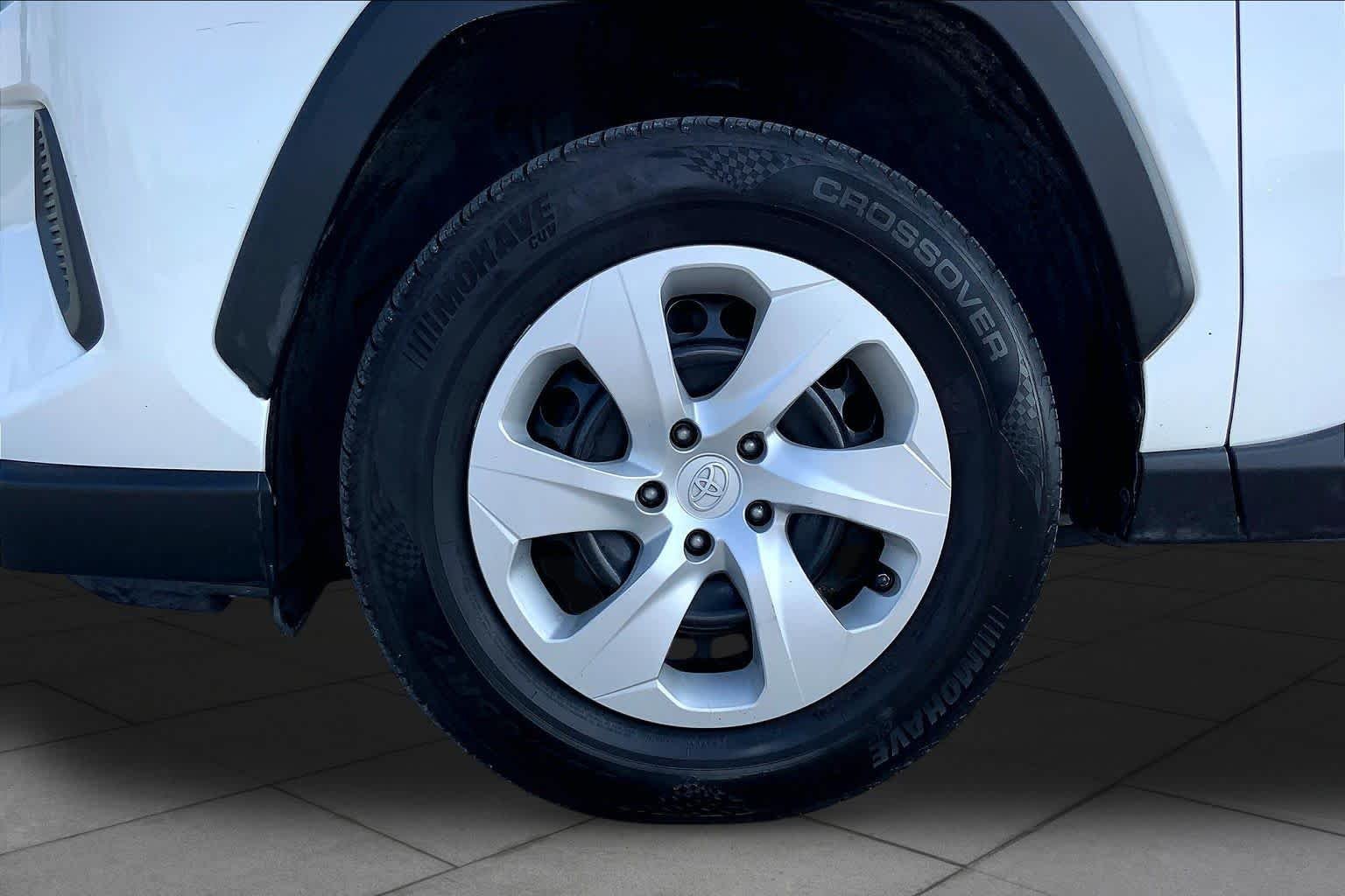 Used 2019 Super White Toyota LE image 11