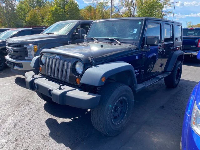 Used 2013 Black Jeep Unlimited Sport image 5