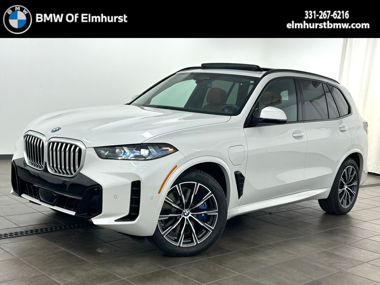 New 2026 Mineral White Metallic BMW xDrive50e image 1