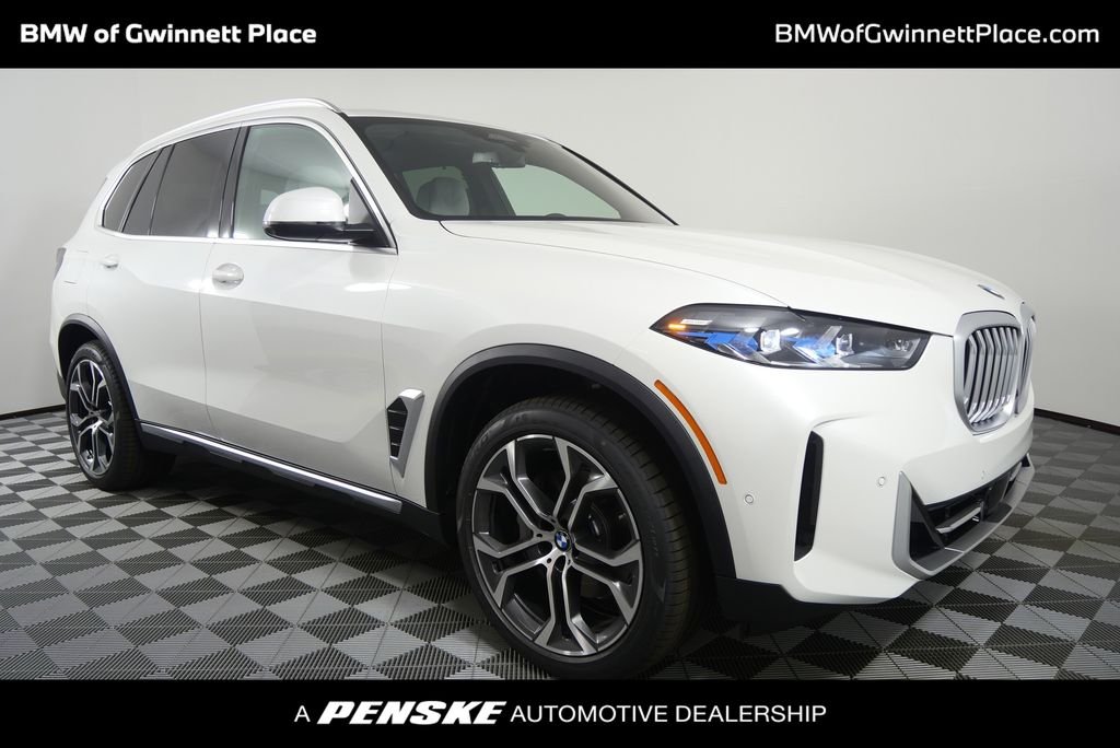 Used 2026 Mineral White Metallic BMW xDrive40i image 1